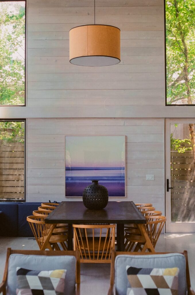 Interior of a Fire Island Pines home featuring wood panel walls and modern architecture.
